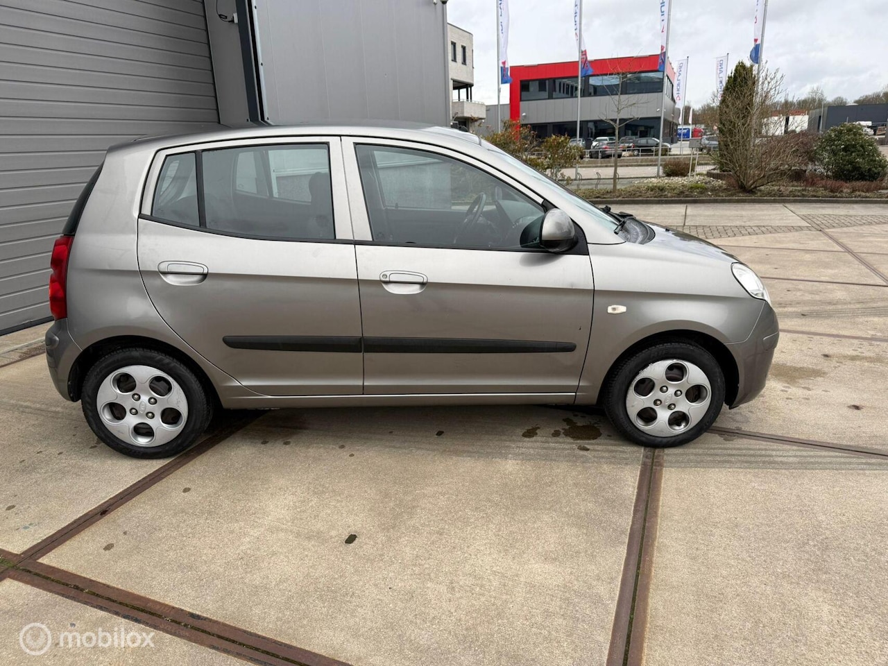 Kia Picanto - 1.1 X-tra First Edition 1.1 X-tra First Edition - AutoWereld.nl