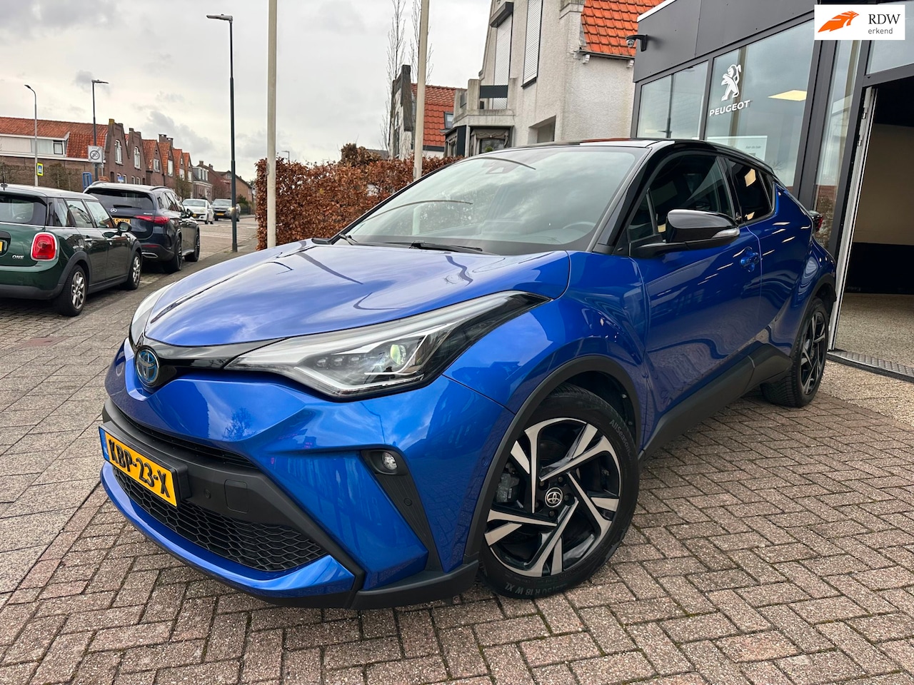 Toyota C-HR - 1.8 Hybrid Style|Bi-Tone|Alarm|Half Leder|Stoel/Stuur Verwarming - AutoWereld.nl