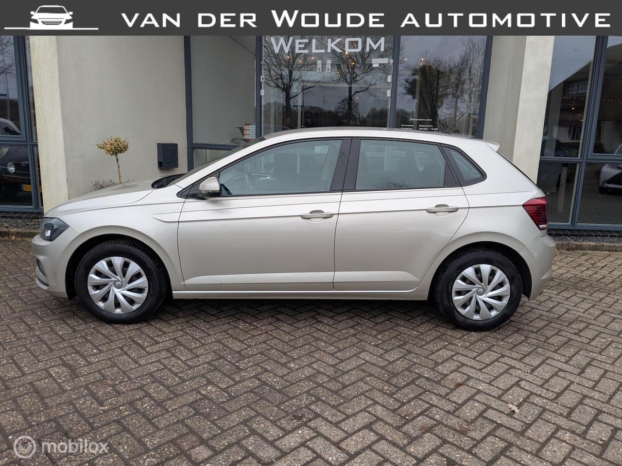 Volkswagen Polo - 1.0 TSI Comfortline Ivory Silver - AutoWereld.nl