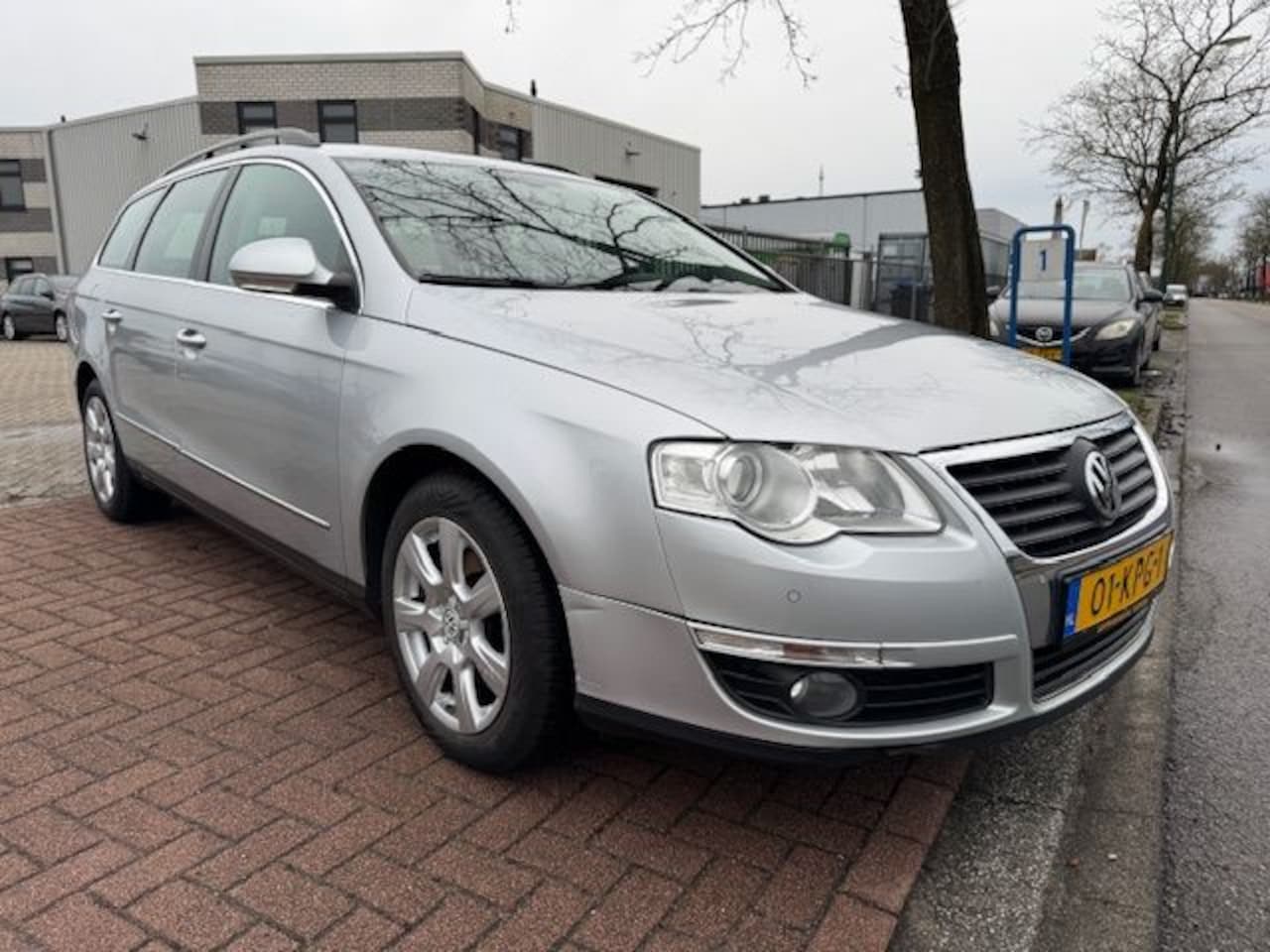 Volkswagen Passat Variant - 1.4 TSI Comfortline BlueMotion Automaat Airco/ECC,Navigatie - AutoWereld.nl