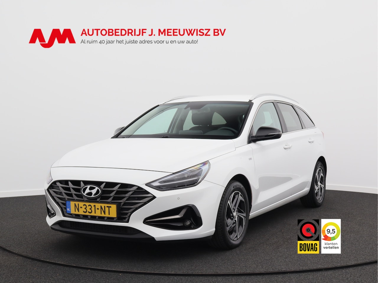 Hyundai i30 Wagon - 1.5 T-GDi MHEV Premium/ lage km/ compleet! - AutoWereld.nl