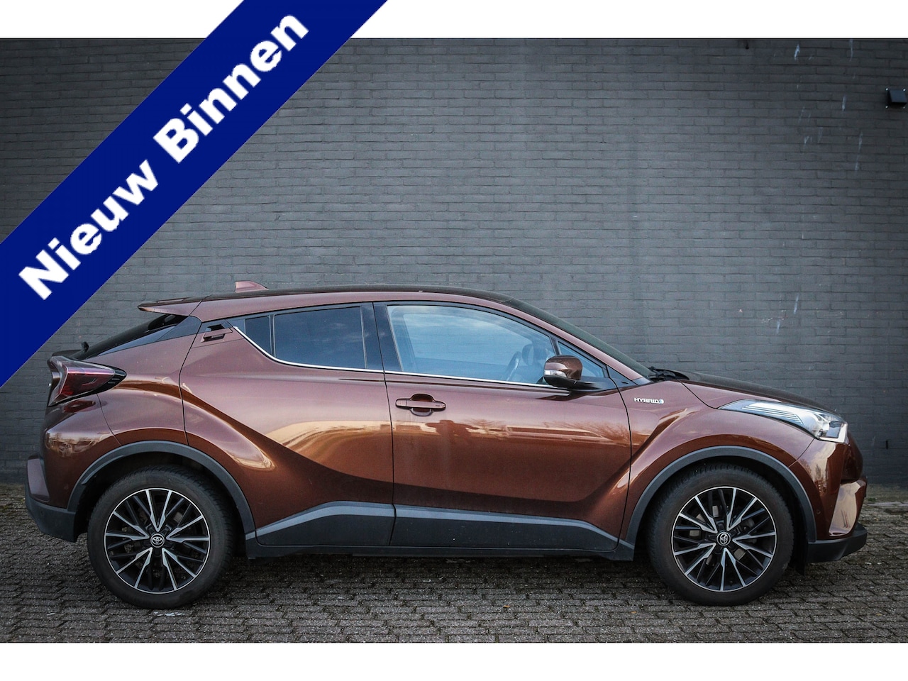 Toyota C-HR - 1.8 Hybrid Executive Net binnen - Nu al te bezichtigen - AutoWereld.nl