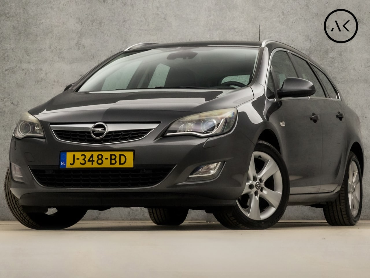 Opel Astra Sports Tourer - 1.4 Turbo Sport 140Pk (CLIMATE, XENON, STUUR/STOELVERWARMING, SPORTSTOELEN, CRUISE, NIEUWE - AutoWereld.nl
