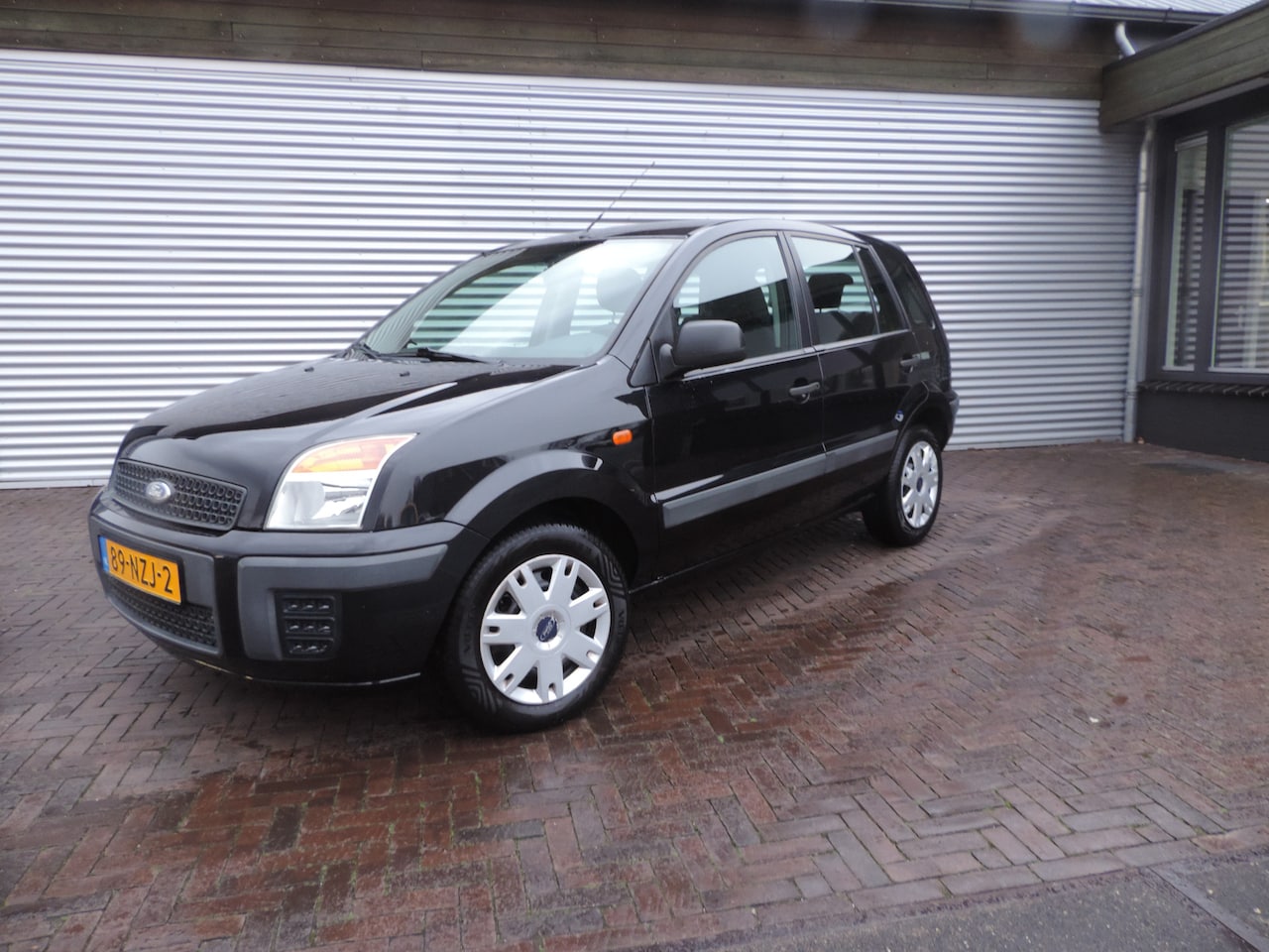 Ford Fusion - 1.4-16V Cool & Sound lage km - AutoWereld.nl