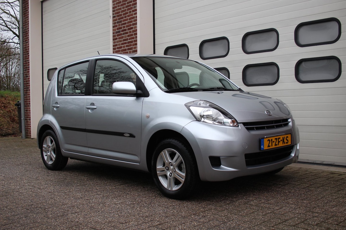 Daihatsu Sirion 2 - 1.3-16V Sport * Automaat / Nap / Airco / LM * - AutoWereld.nl