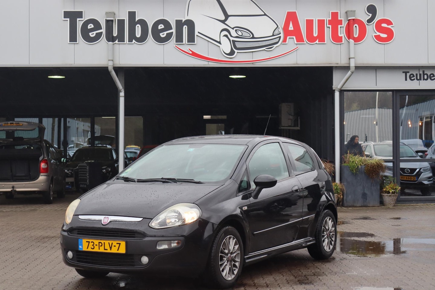 Fiat Punto Evo - 1.3 M-Jet Dynamic Airco, Cruise control, Trekhaak, Elektrische ramen, Lichtmetalen wielen - AutoWereld.nl