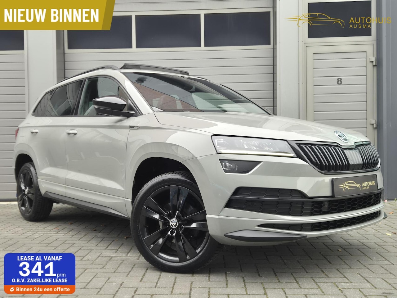 Skoda Karoq - 1.5 TSI ACT Sportline Business Virtual/Pano/Canton - AutoWereld.nl