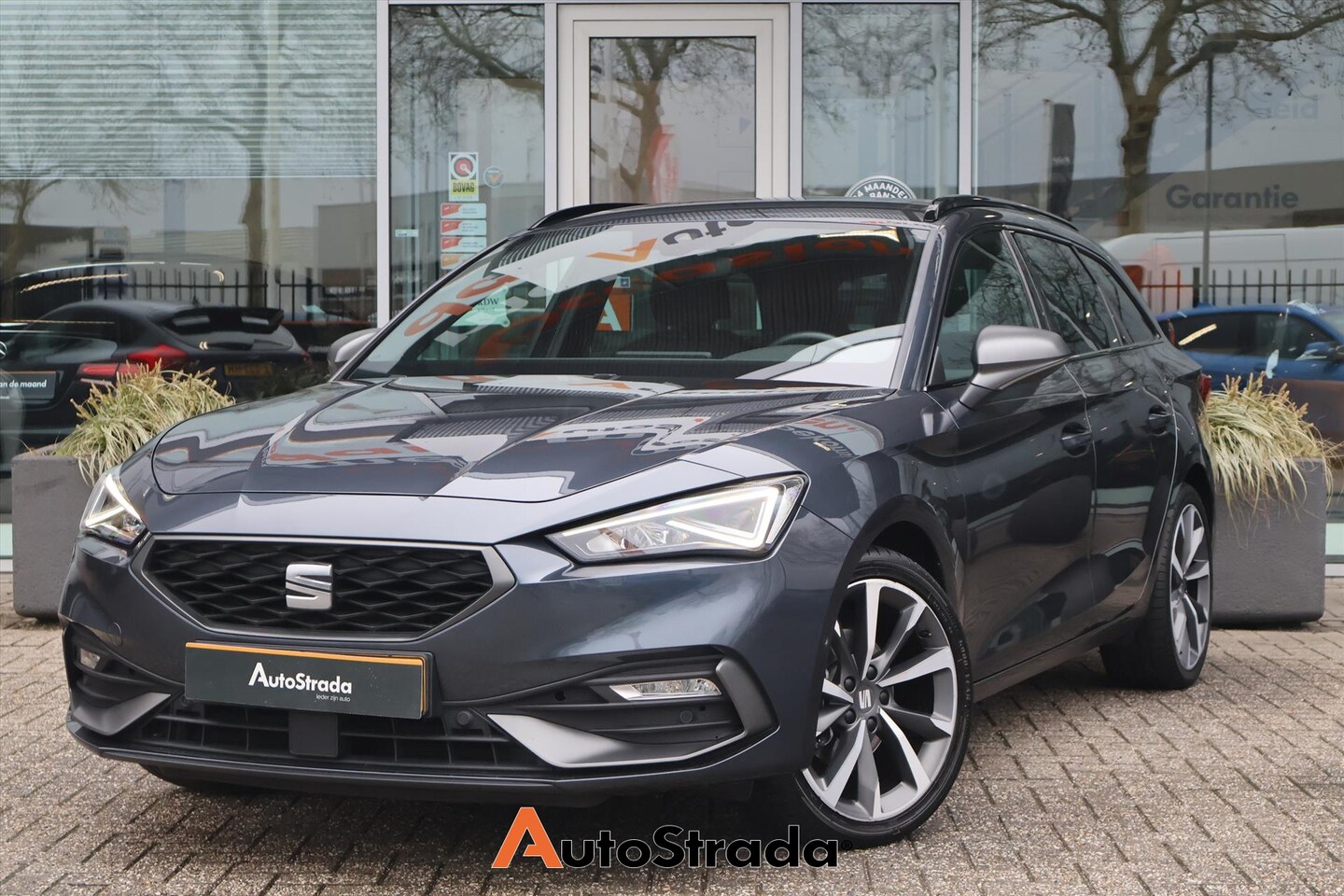 SEAT Leon Sportstourer - 1.5 FR TSI 150pk | Cruise | Sfeer | Virtual | Navi | LED | Carplay | Trekhaak | - AutoWereld.nl