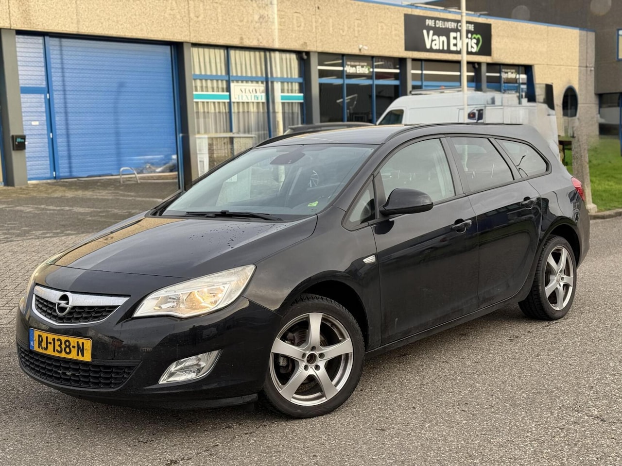 Opel Astra Sports Tourer - 1.4 Turbo Edition 6-BAK Airco - AutoWereld.nl