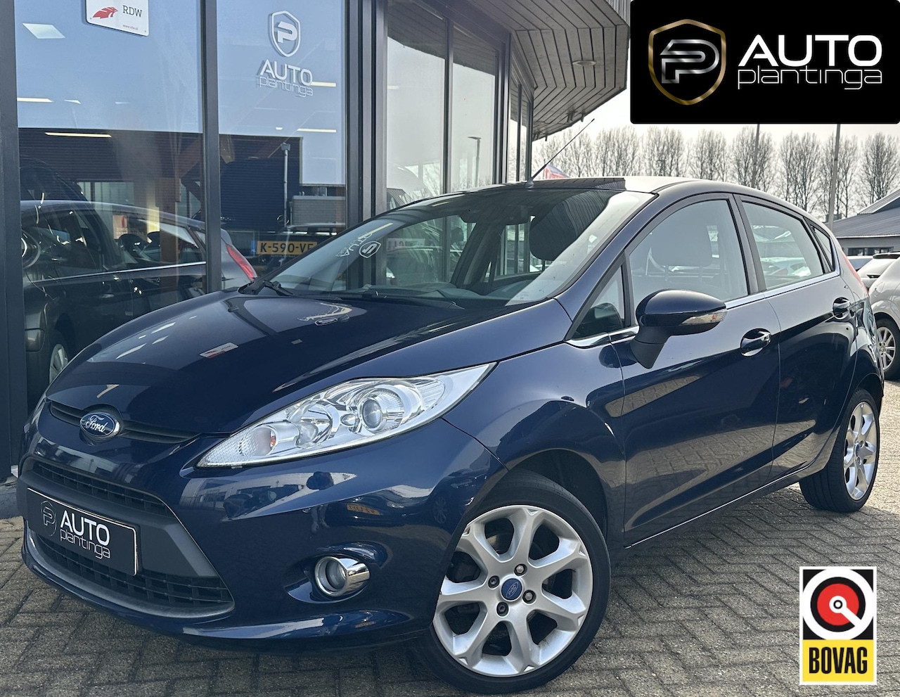 Ford Fiesta - 1.25 Titanium 82PK | Zeer Nette Staat | NL AUTO | Cruise Control | Climate Control |  Voor - AutoWereld.nl