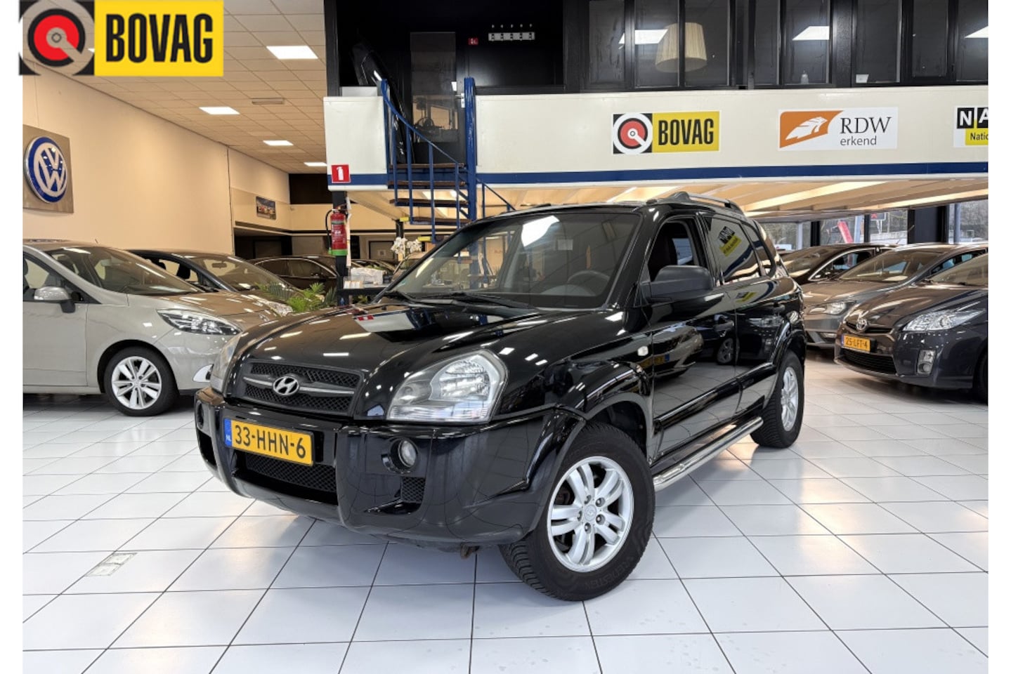 Hyundai Tucson - 2.0i Dyn. Executive Bovag garantie Airco - AutoWereld.nl