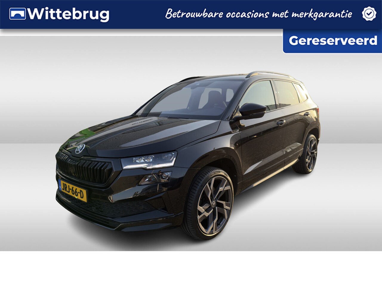 Skoda Karoq - 1.5 TSI ACT Sportline Business / 19"LMV / CAMERA / Elektr. Klep / NAVI / APP.Connect / Ele - AutoWereld.nl