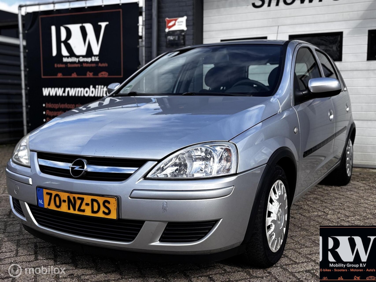 Opel Corsa - 1.2-16V Cosmo NETTE AUTO*NIEUWE APK BIJ AFLEVERING - AutoWereld.nl