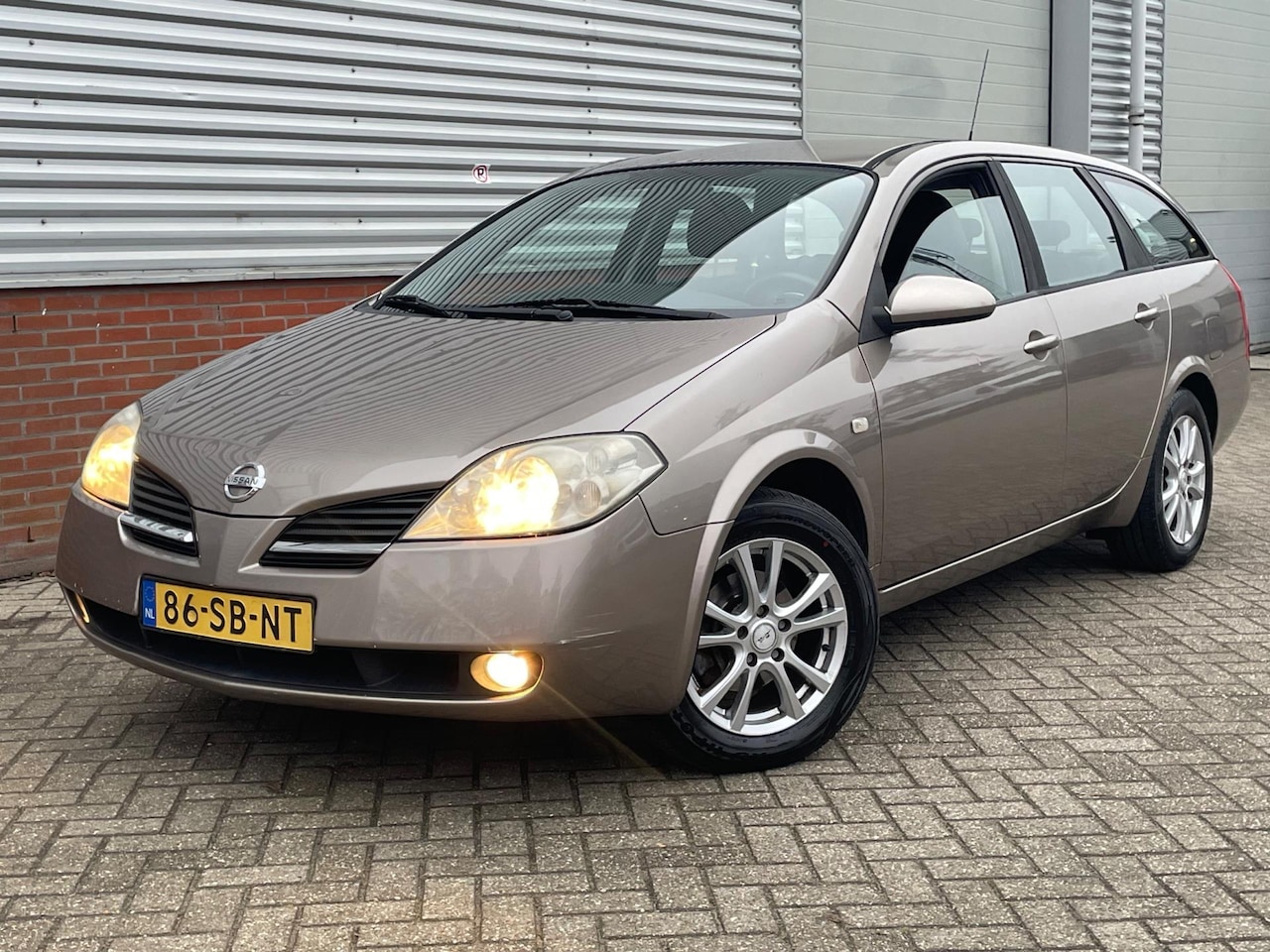 Nissan Primera Estate - 1.8 Visia Automaat Airco Ecc Achteruitrijcamera - AutoWereld.nl