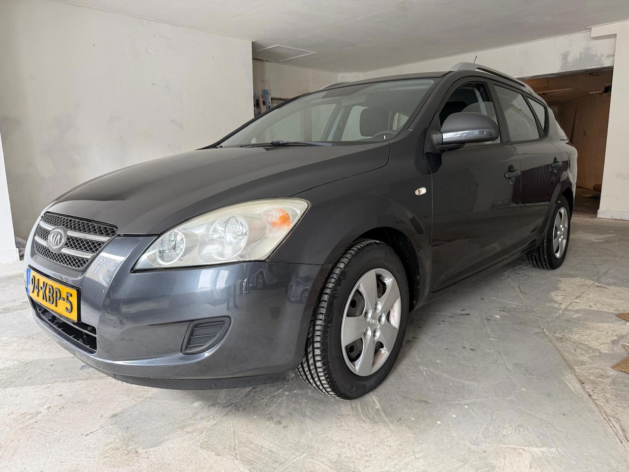 Kia Cee'd Sporty Wagon - 1.4 CVVT X-tra 1.4 CVVT X-tra, Airco, NAP - AutoWereld.nl