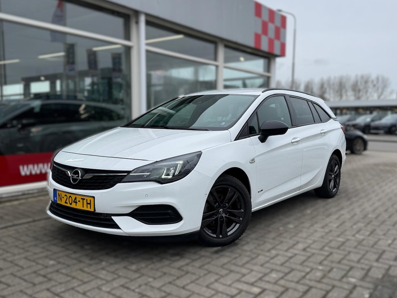 Opel Astra Sports Tourer - 1.2 Design & Tech|Carplay|Dakdragers|Cruise|Camera - AutoWereld.nl