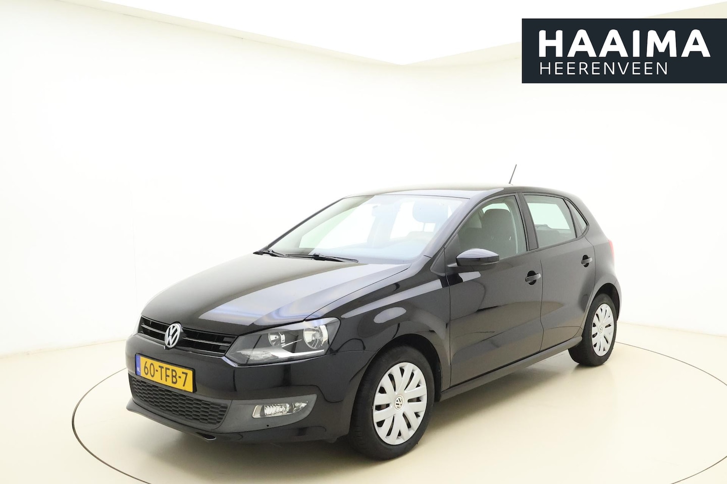 Volkswagen Polo - 1.2 TSI Comfortline | Airco | Cruise Control | Audiosysteem | Middenarmsteun - AutoWereld.nl