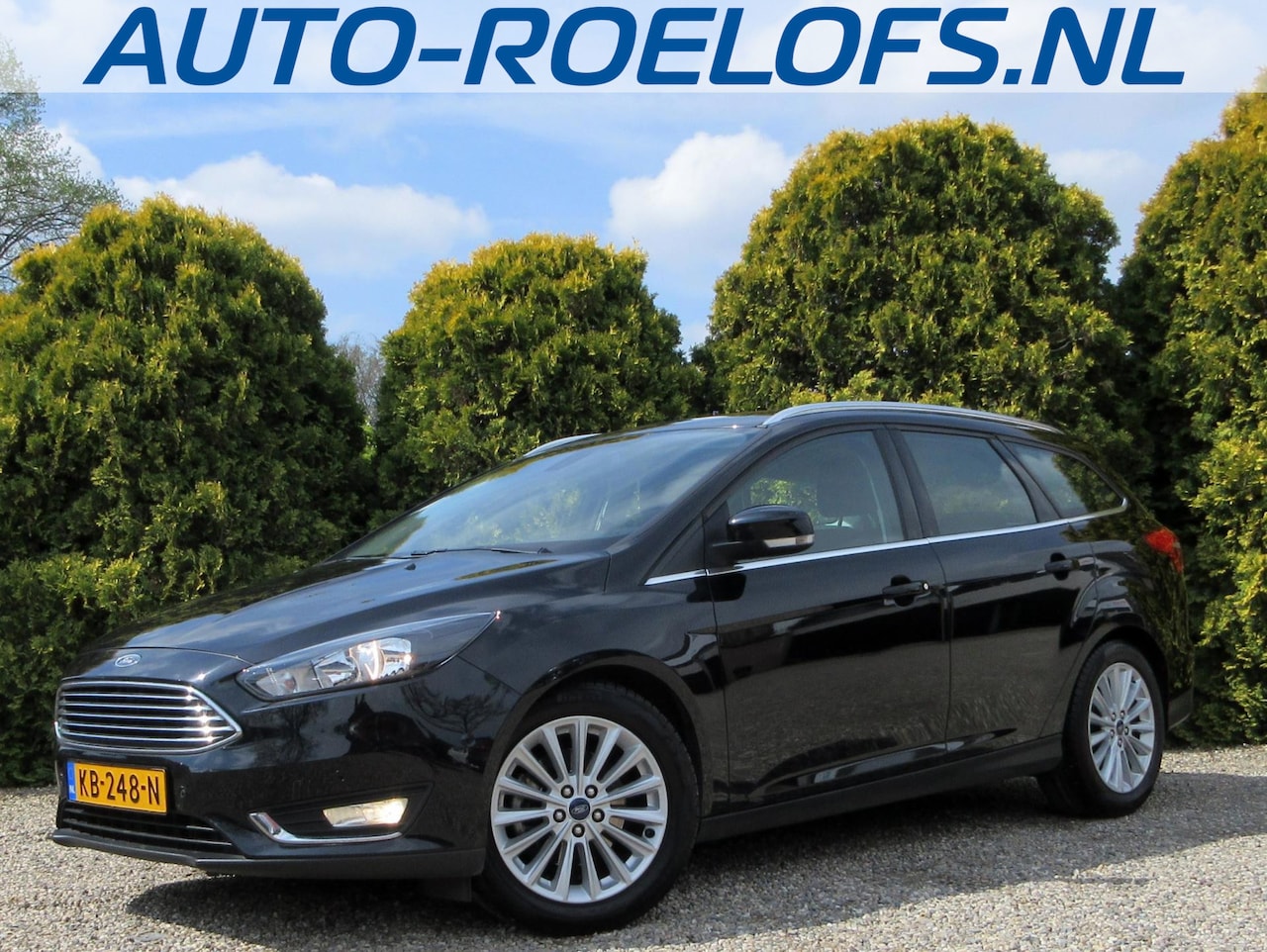 Ford Focus Wagon - 1.5 Titanium *Navigatie*Trekhaak* - AutoWereld.nl