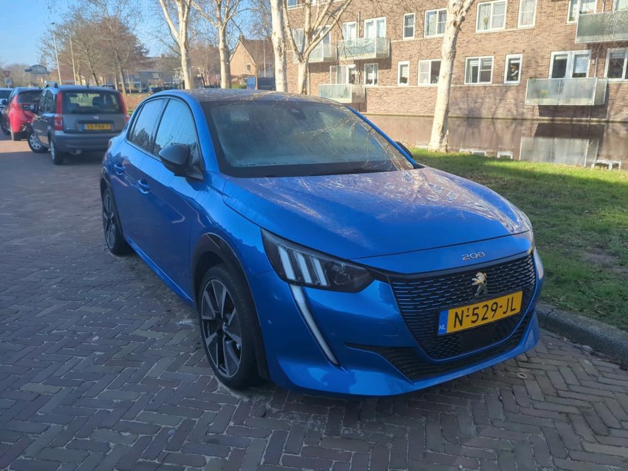 Peugeot e-208 - EV GT Pack 50kWh 3 Fase | Adaptive Cruise | Stoelverwarming | Alcantara | Keyless-Entry | - AutoWereld.nl