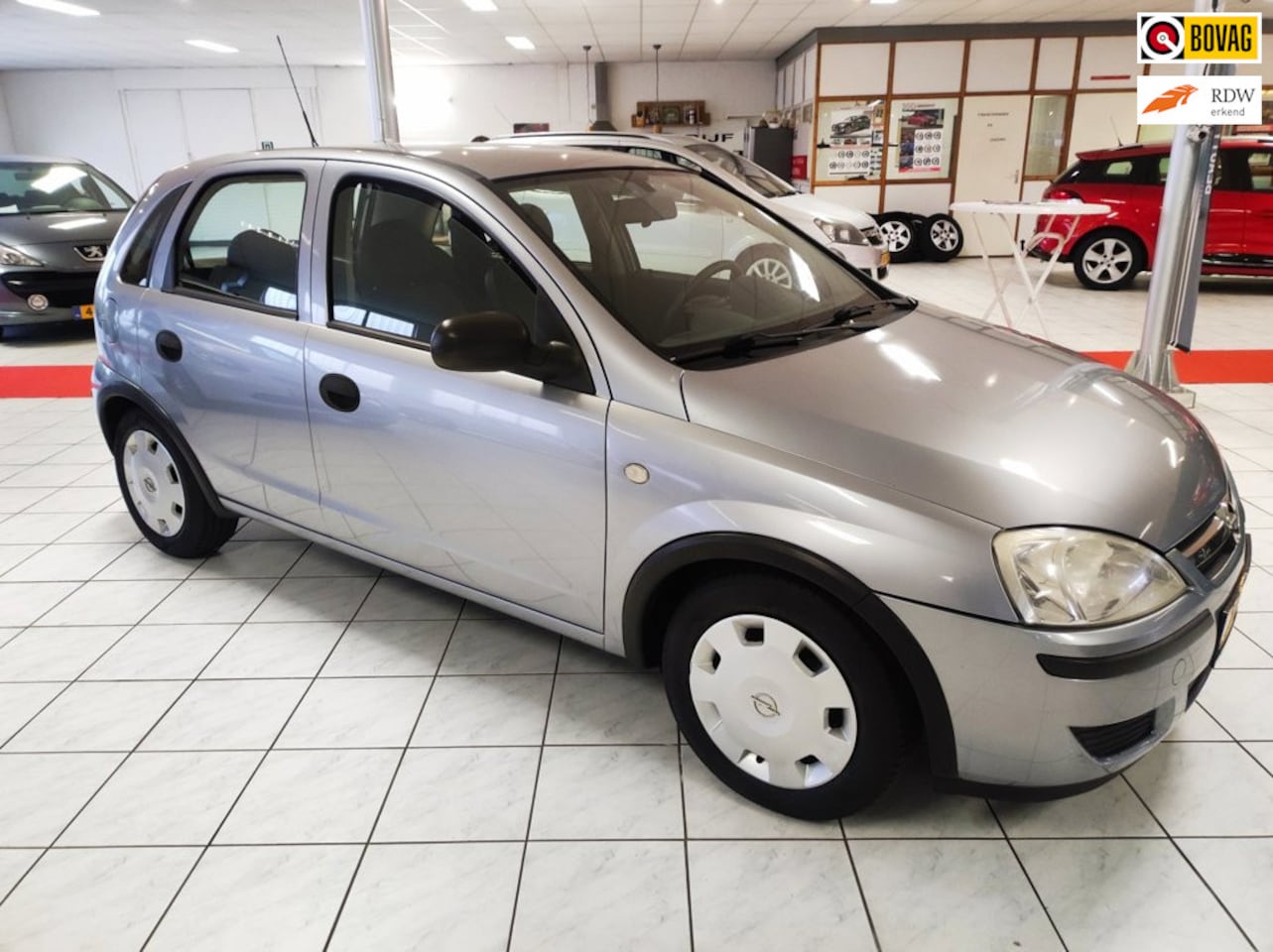 Opel Corsa-e - 1.2-16V Essentia 5 drs.airco- audio-electric pakket - AutoWereld.nl