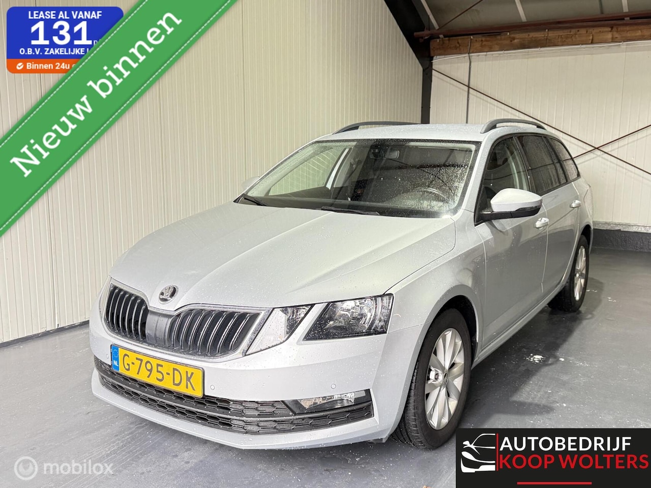 Skoda Octavia Combi - 1.0 TSI Sport Business Trekhaak - AutoWereld.nl