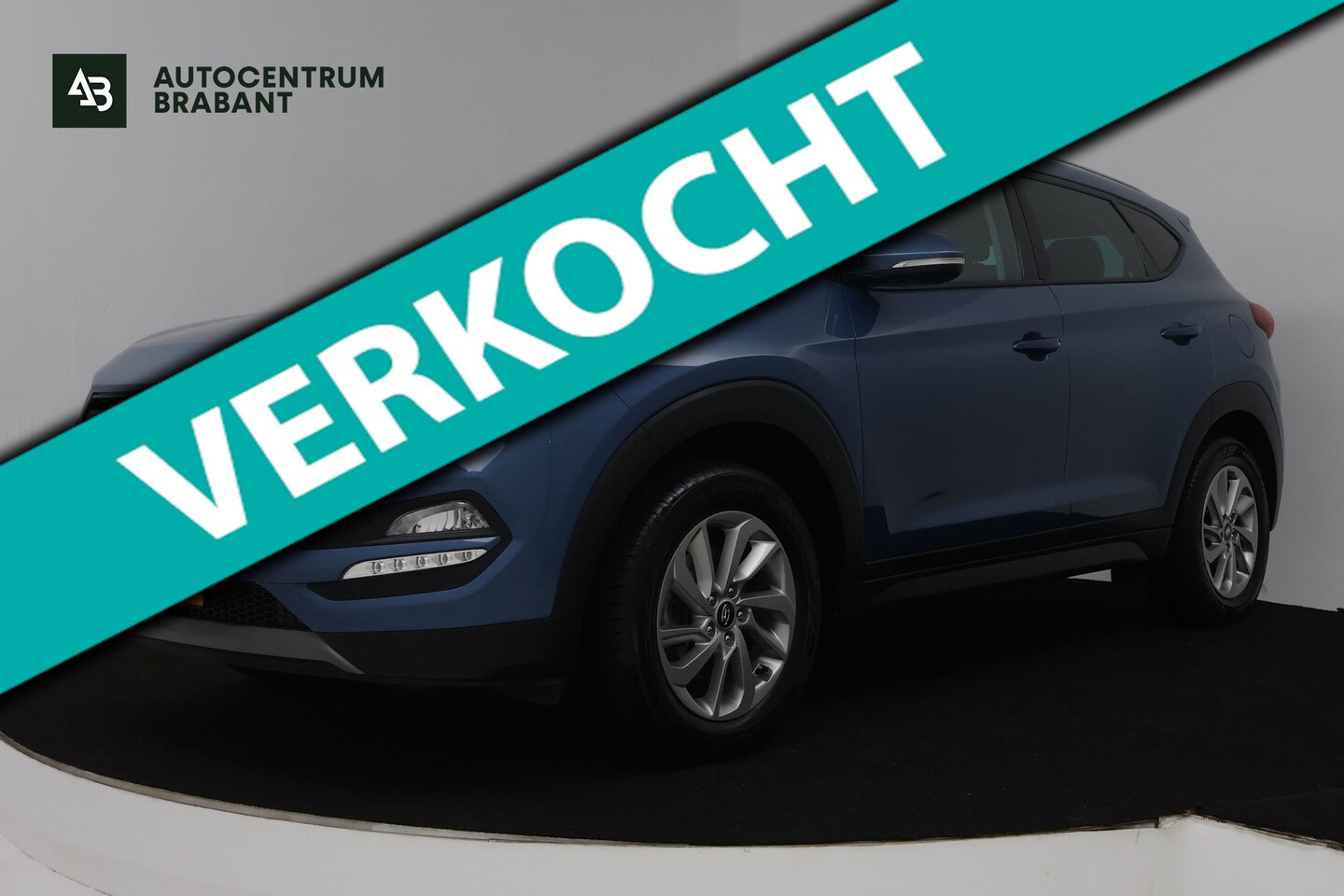Hyundai Tucson - 1.6 GDi Comfort (TREKHAAK, STOEL/STUUR VERWARMING, ACHTERUITRIJCAMERA, NAVIGATIE, PARKEERS - AutoWereld.nl