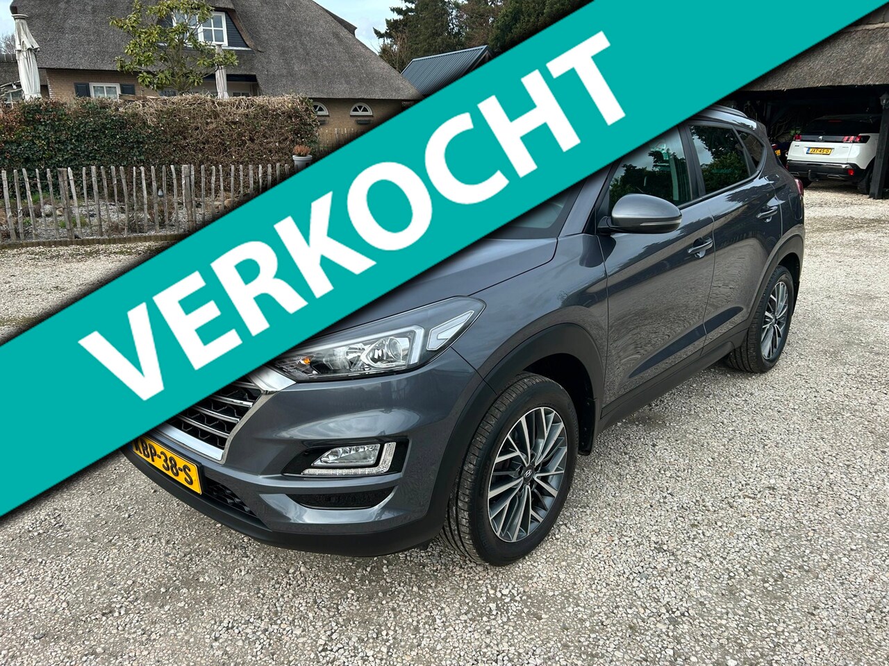 Hyundai Tucson - 1.6 GDi Navi, ECC, Stoelverwarming Trekhaak - AutoWereld.nl
