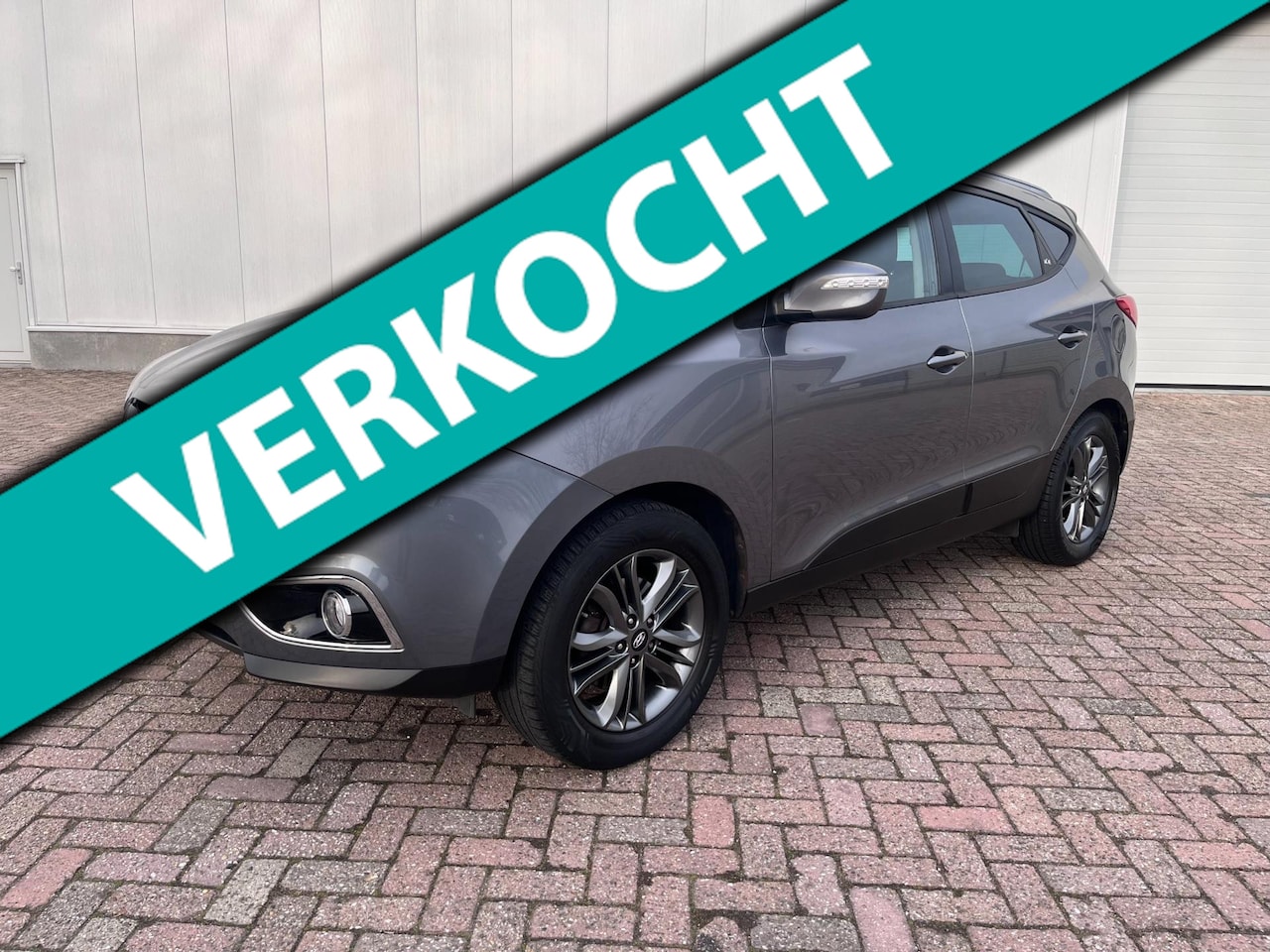 Hyundai ix35 - 1.6i GDI i-Catcher navi camera stoel verwarming 2014 - AutoWereld.nl