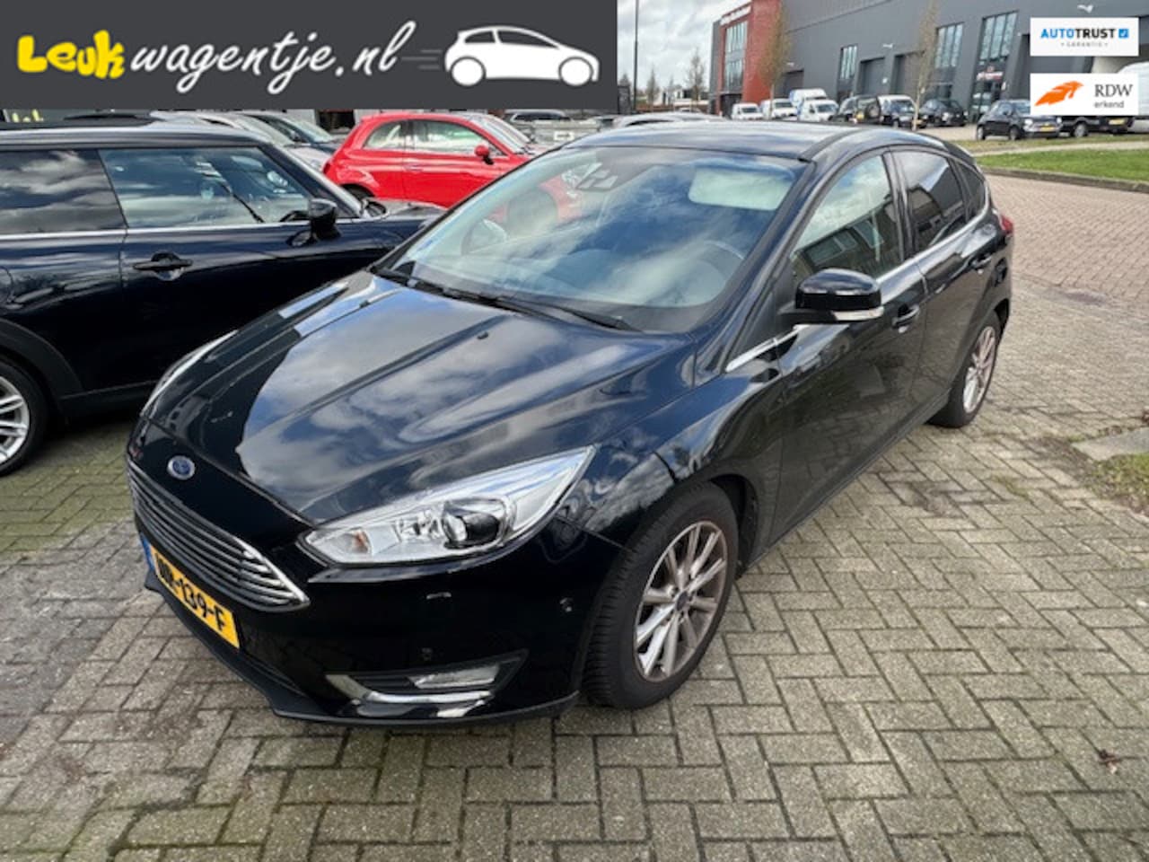 Ford Focus - 1.0 Titanium Edition *leder *navi *xenon *etc. - AutoWereld.nl