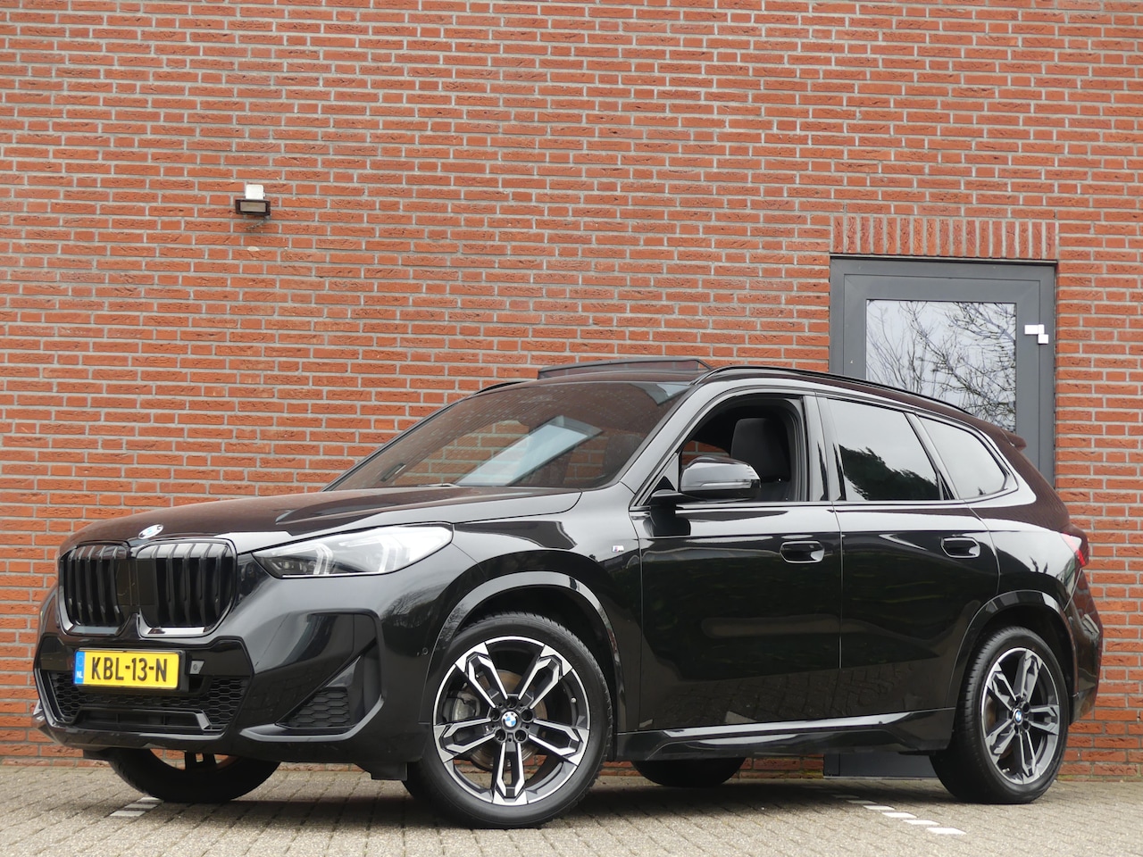 BMW X1 - sDrive18i M-Sport / Panoramadak - AutoWereld.nl