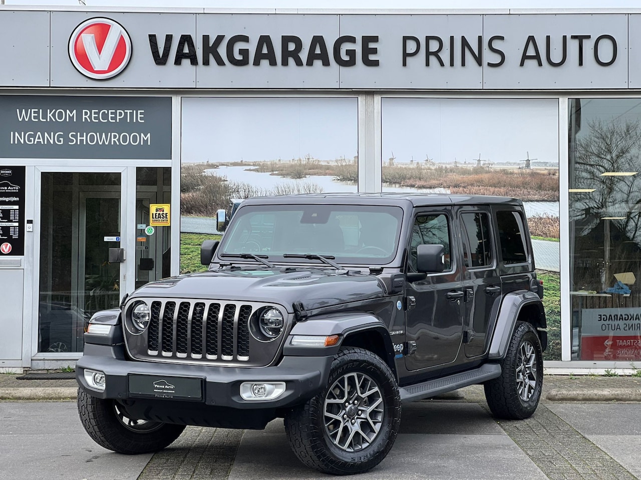 Jeep Wrangler Unlimited - 4xe 380 Sahara |STUURVERWARMING|HARD-TOP|LEDER|CAMERA|656,-P/M| 4651 - AutoWereld.nl