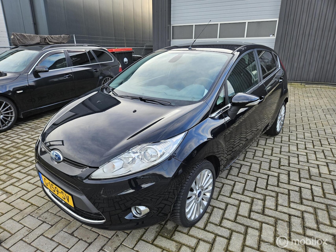Ford Fiesta - 1.4 Ghia AIRCO APK 03/2027 DEALERONDERHOUDEN VASTEPRIJS - AutoWereld.nl