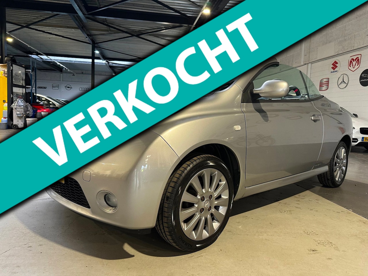 Nissan Micra - 1.6 Tekna Plus/Carplay/Dealer onderhouden/2x sleutels - AutoWereld.nl