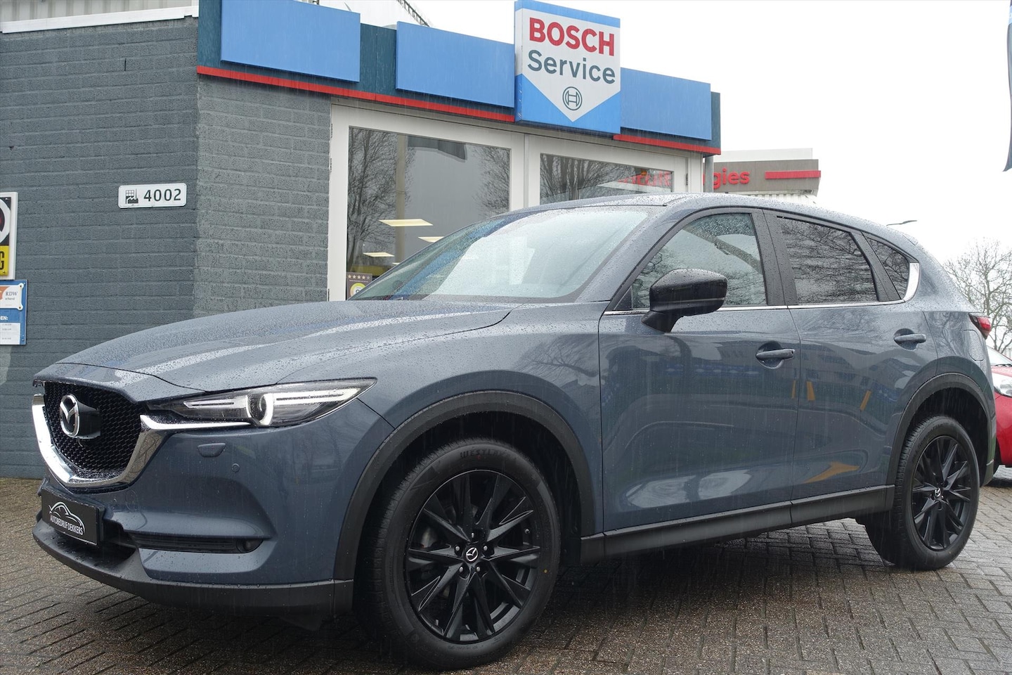 Mazda CX-5 - 2.5 SKYACTIV-G 194pk 2WD Aut Edition 100 | HEAD UP | 360CAM | HALF LEDER | CARPLAY - AutoWereld.nl