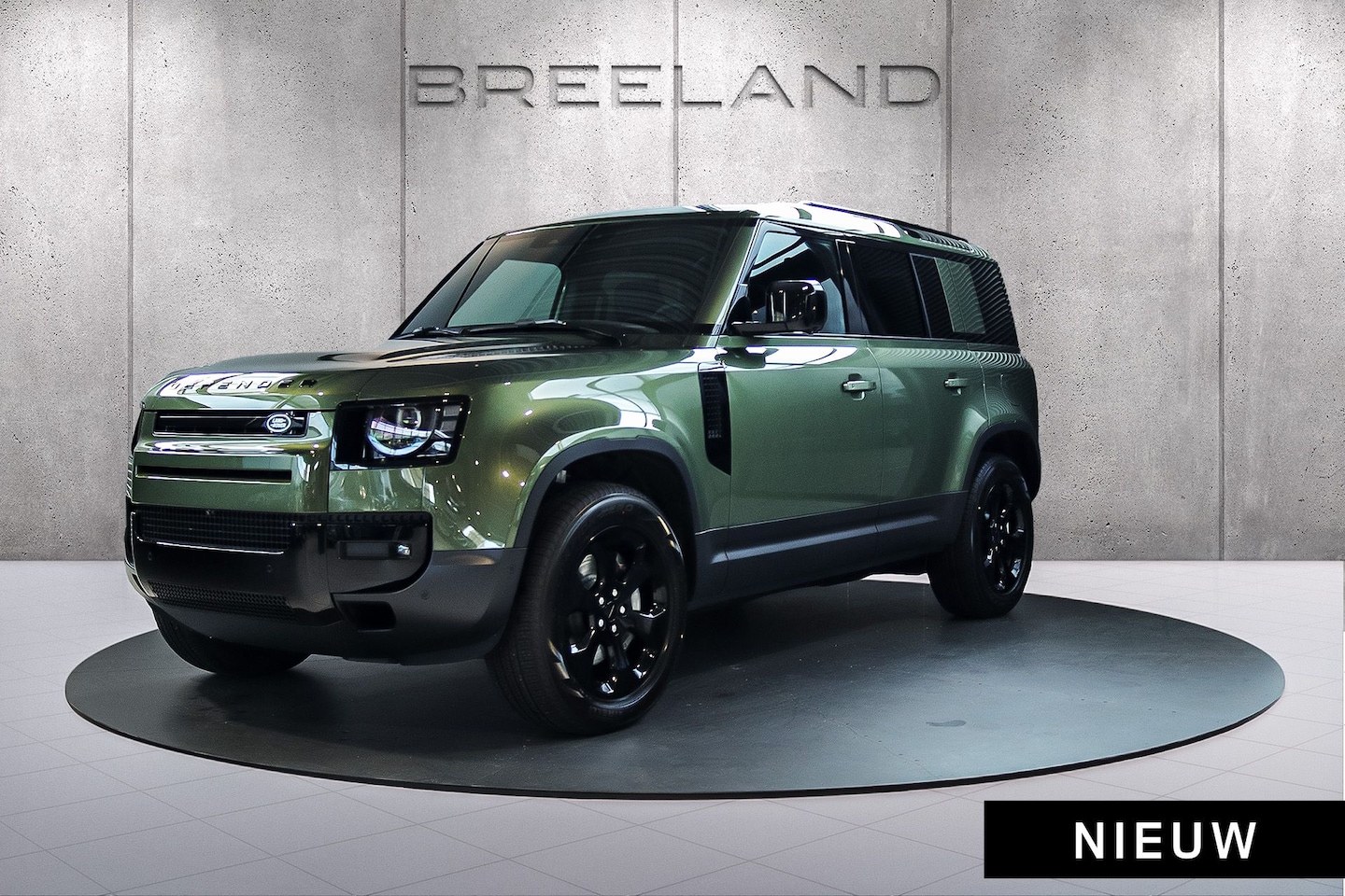 Land Rover Defender 110 - 2.0 P300e 110 Forest Edition Panoramadak Trekhaak Cold Climate - AutoWereld.nl