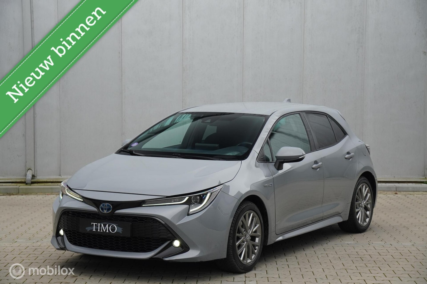 Toyota Corolla - 1.8 Hybrid Nardo Grey - AutoWereld.nl