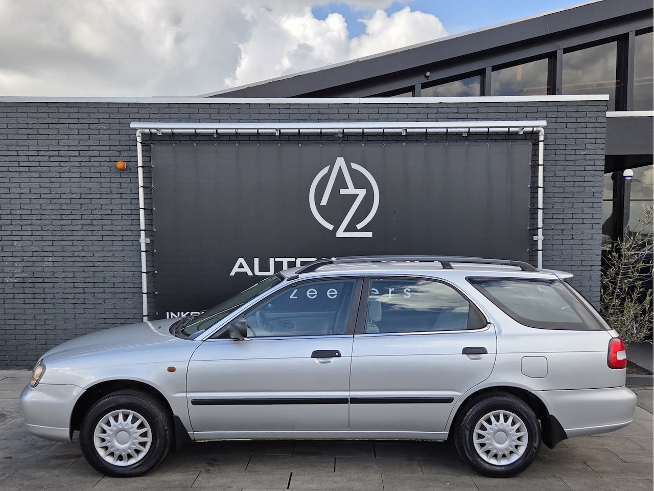 Suzuki Baleno Estate - 1.6 GLX Estate *AC* - AutoWereld.nl