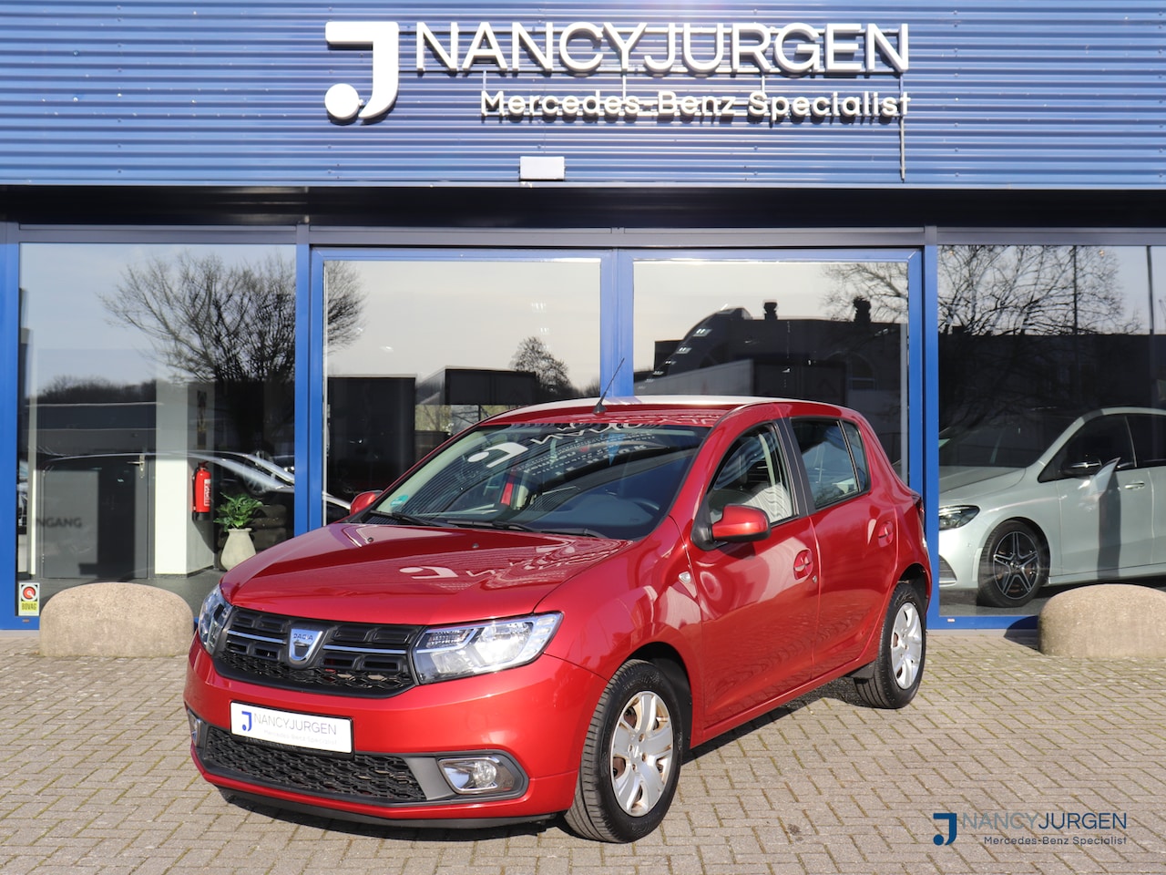 Dacia Sandero - 0.9 TCe Laureate | Parkeer Sensoren | Cruise Control | Navi | Start/Stop | Bluetooth | - AutoWereld.nl