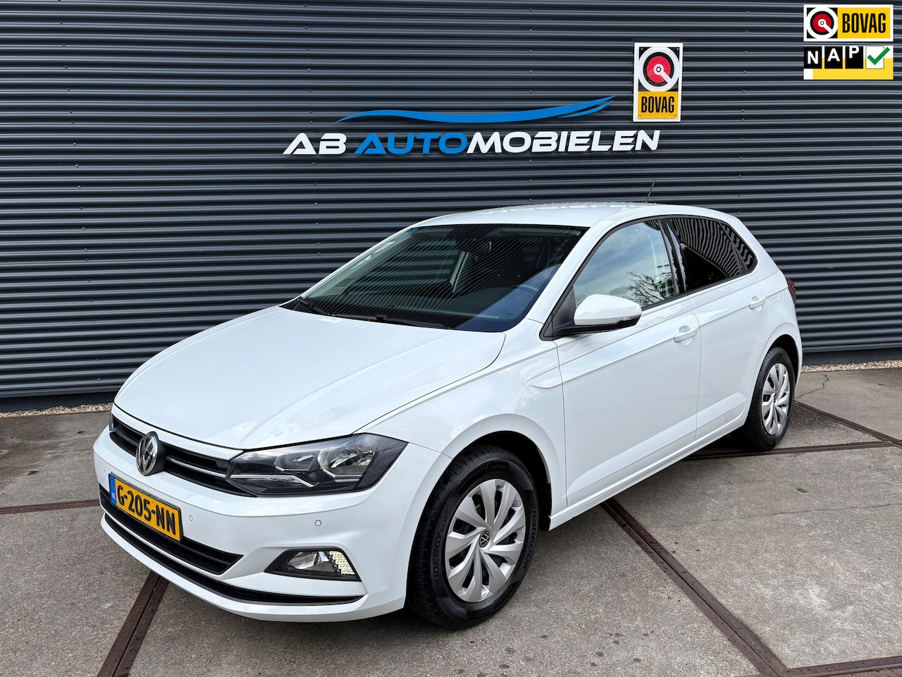 Volkswagen Polo - 1.0 TSI Comfortline PDC/ CARPLAY/ NAVI - AutoWereld.nl