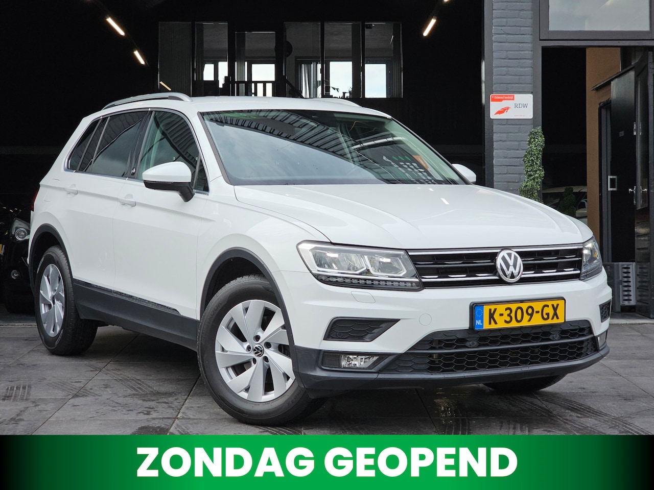 Volkswagen Tiguan - 1.4 TSI Highline|AUT|Cruise|Trekhaak|PDC - AutoWereld.nl