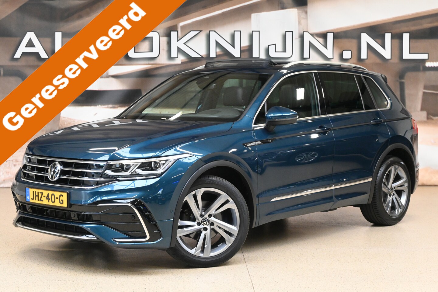 Volkswagen Tiguan - 1.5 TSI 150pk R-Line Business+ | Leder | Memory | Pano | Head-up | 100% (Dealer) onderhoud - AutoWereld.nl