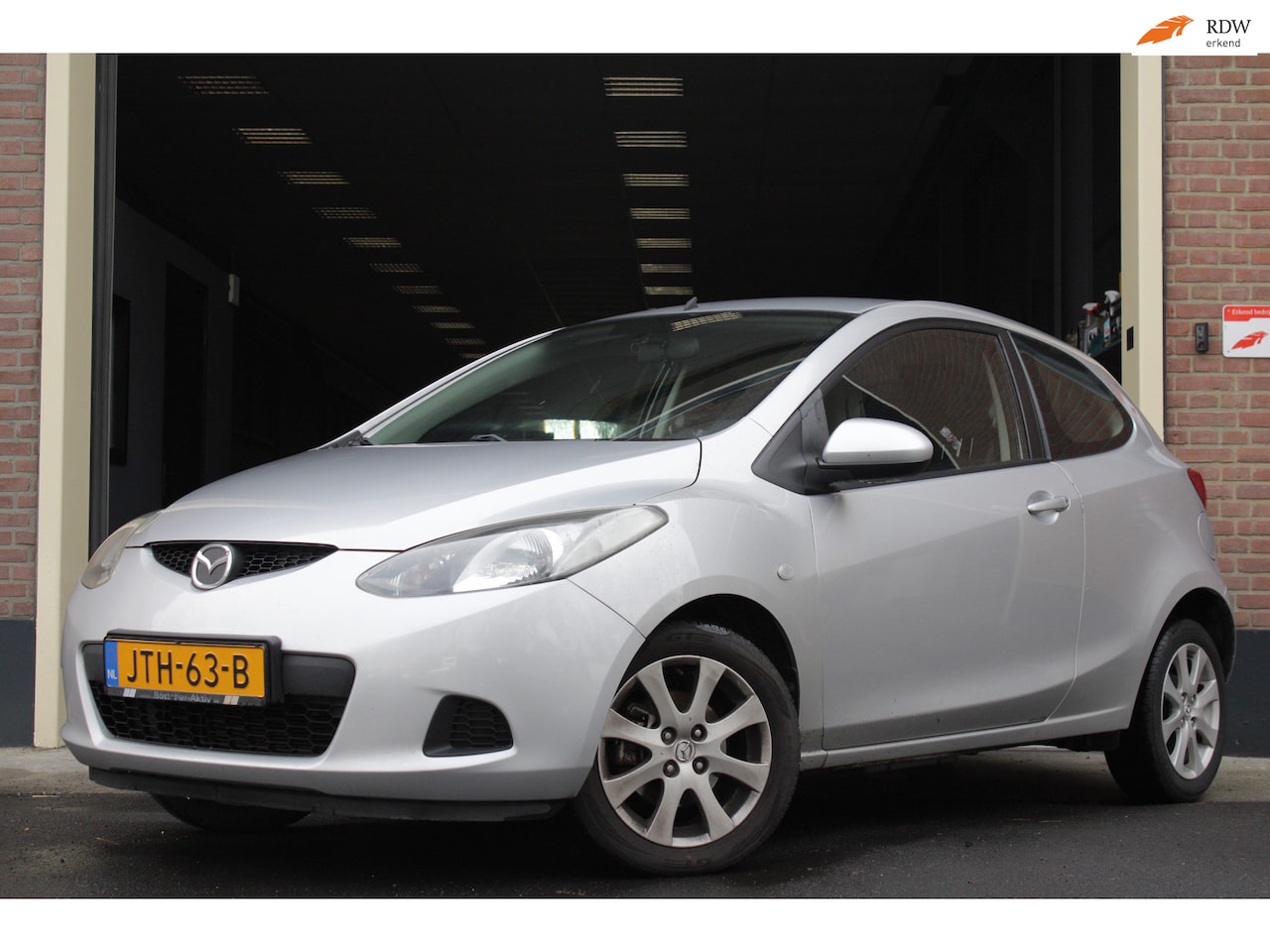 Mazda 2 - 1.3 TS |Netjes||LageKM| Stoelverwarming|Airco|Aux| - AutoWereld.nl