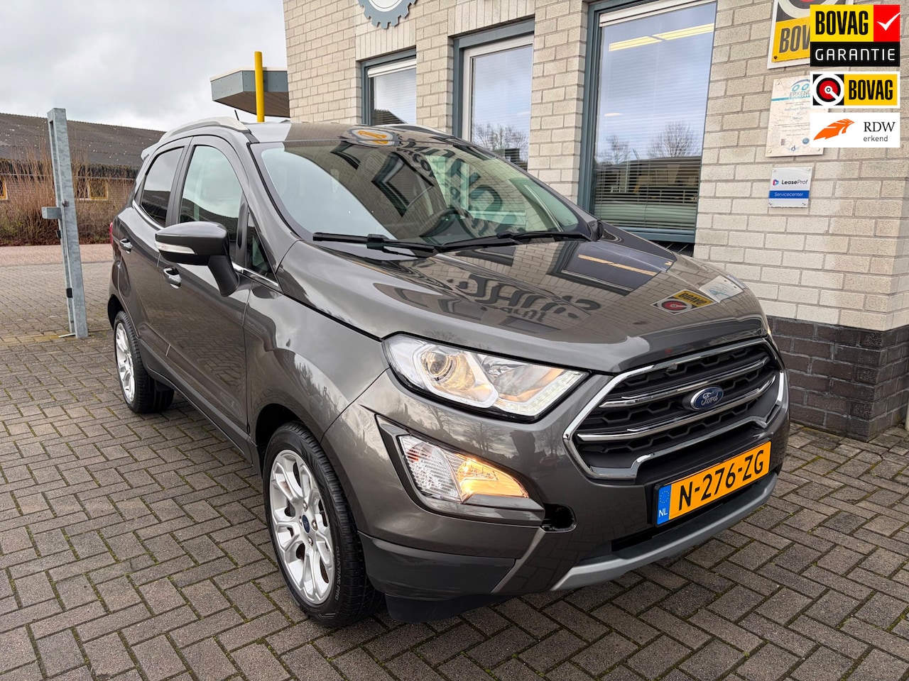 Ford EcoSport - 1.0 EcoBoost Titanium / PDC achter / Climate Controle / Cruise Controle / Telefoon / Navig - AutoWereld.nl