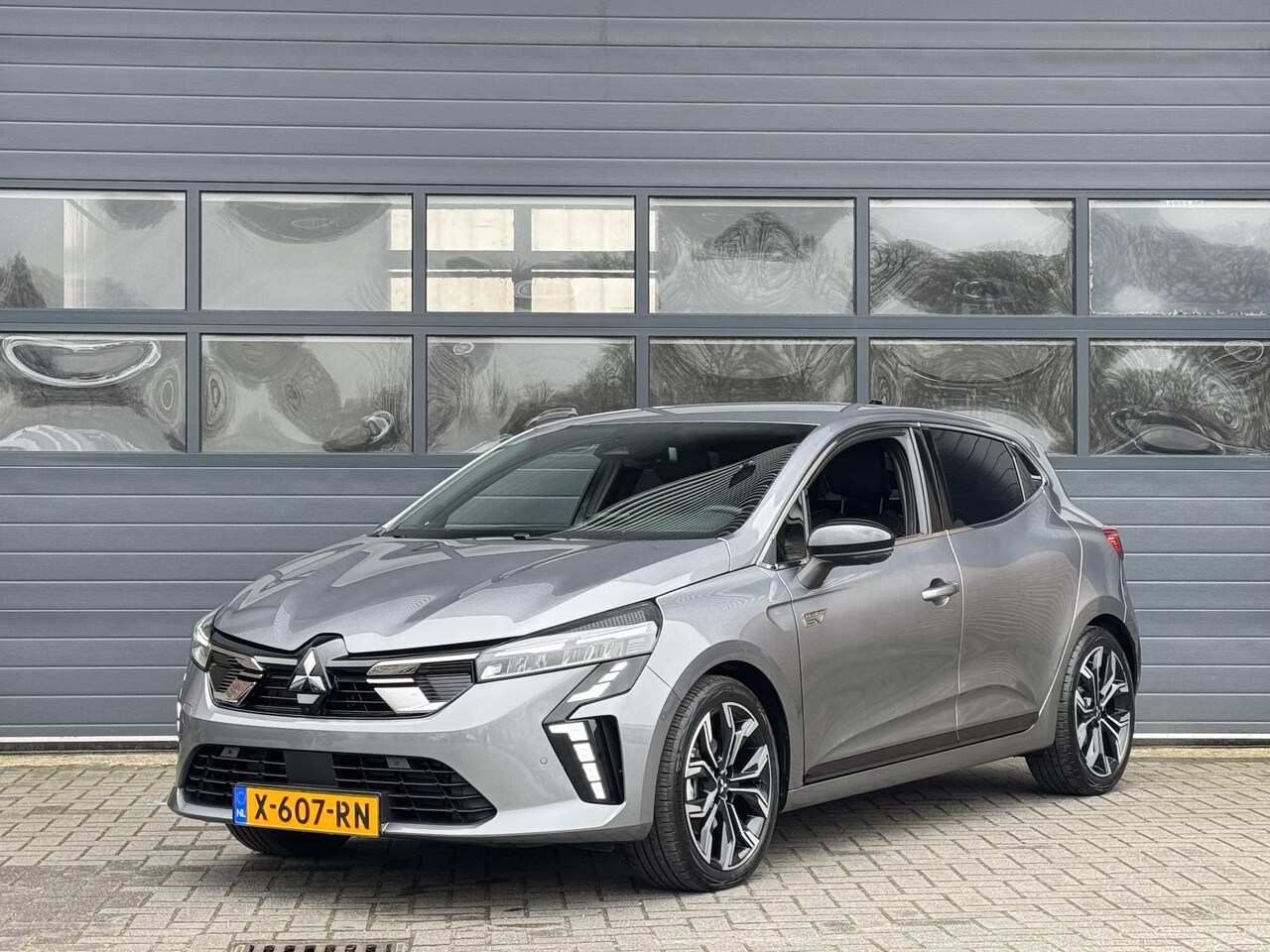 Mitsubishi Colt - 1.6 HEV INSTYLE I AUTOMAAT I TREKHAAK I APPLE CARPLAY I ADAPTIVE CRUISE - AutoWereld.nl