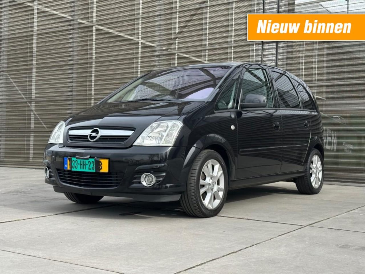 Opel Meriva - 1.6-16V COSMO AIRCO/NAVI/LM VELGEN/AUTOMAAT 1e EIG.APK 3-4-2027 !! - AutoWereld.nl