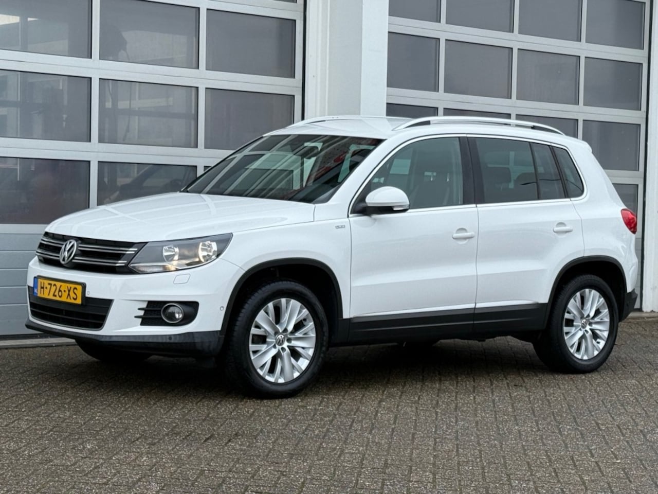 Volkswagen Tiguan - 1.4 TSI 122PK Life Navi Pdc Stoelverw Trekhaak - AutoWereld.nl