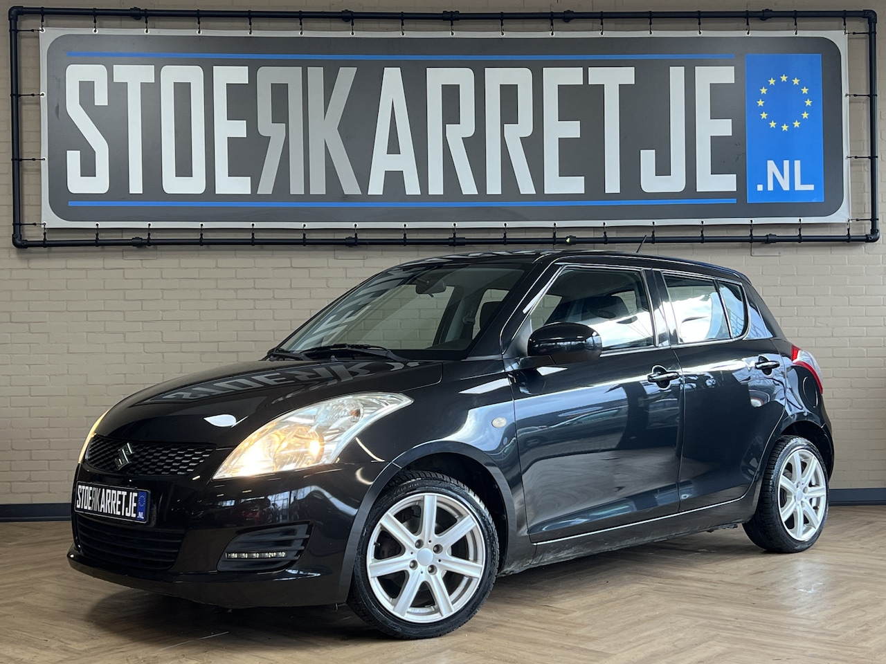 Suzuki Swift - 1.2 Comfort EASSS Airco | Stoelverwarming | 16" | radio MP3 | USB | 1ste Eigenaar, Volledi - AutoWereld.nl