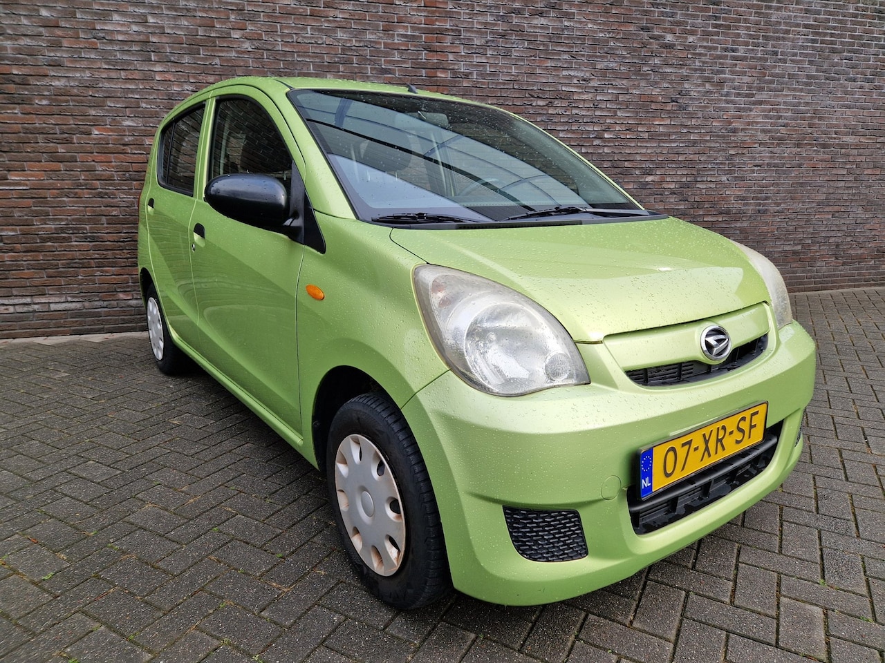 Daihatsu Cuore - 1.0 Trend radio cd APK 03-27 dealer onderhouden - AutoWereld.nl