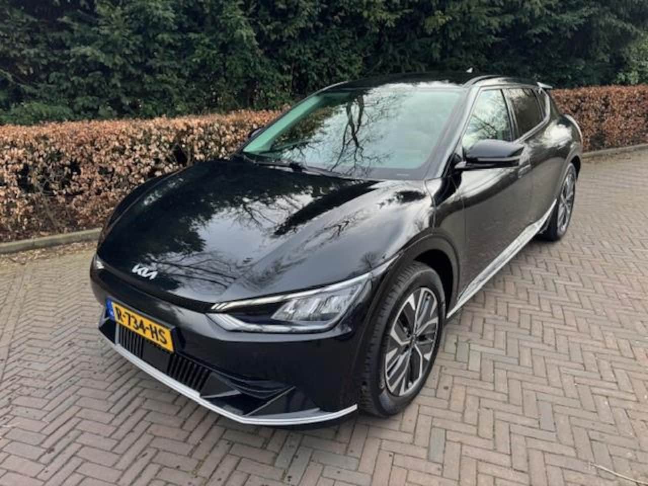 Kia EV6 - PLUS 77.4KWH SOH 100% TREKHAAK/LEER/NAV/ACARPLAY/LED - AutoWereld.nl