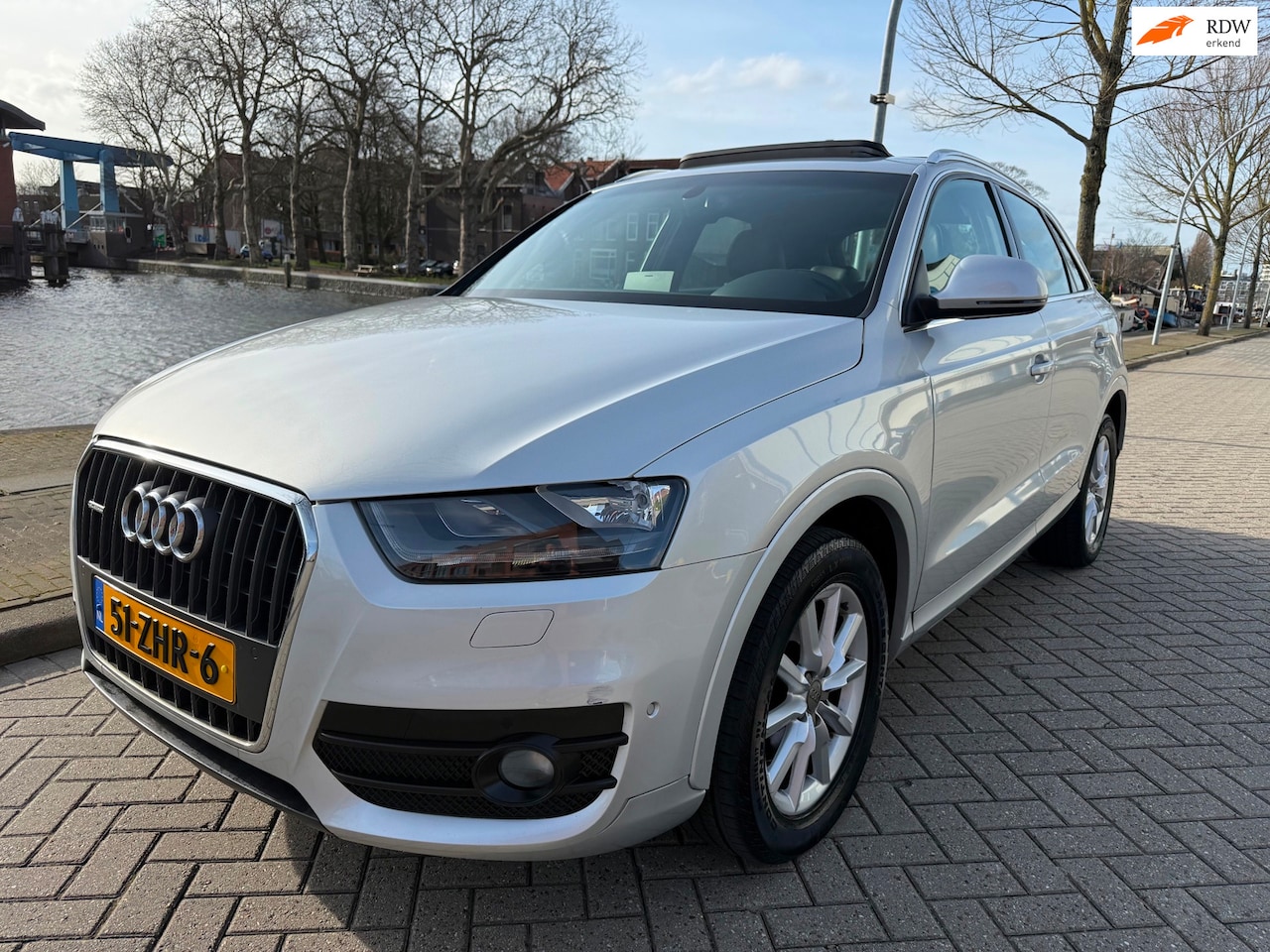 Audi Q3 - 2.0 TFSI quattro Pro Line_PANORAMADAK_LEER_NETTE AUTO - AutoWereld.nl